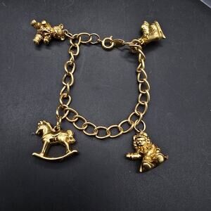 Avon Gold Tone Charm Bracelet Childrens Toy Doll Skate Bead Horse Vintage
